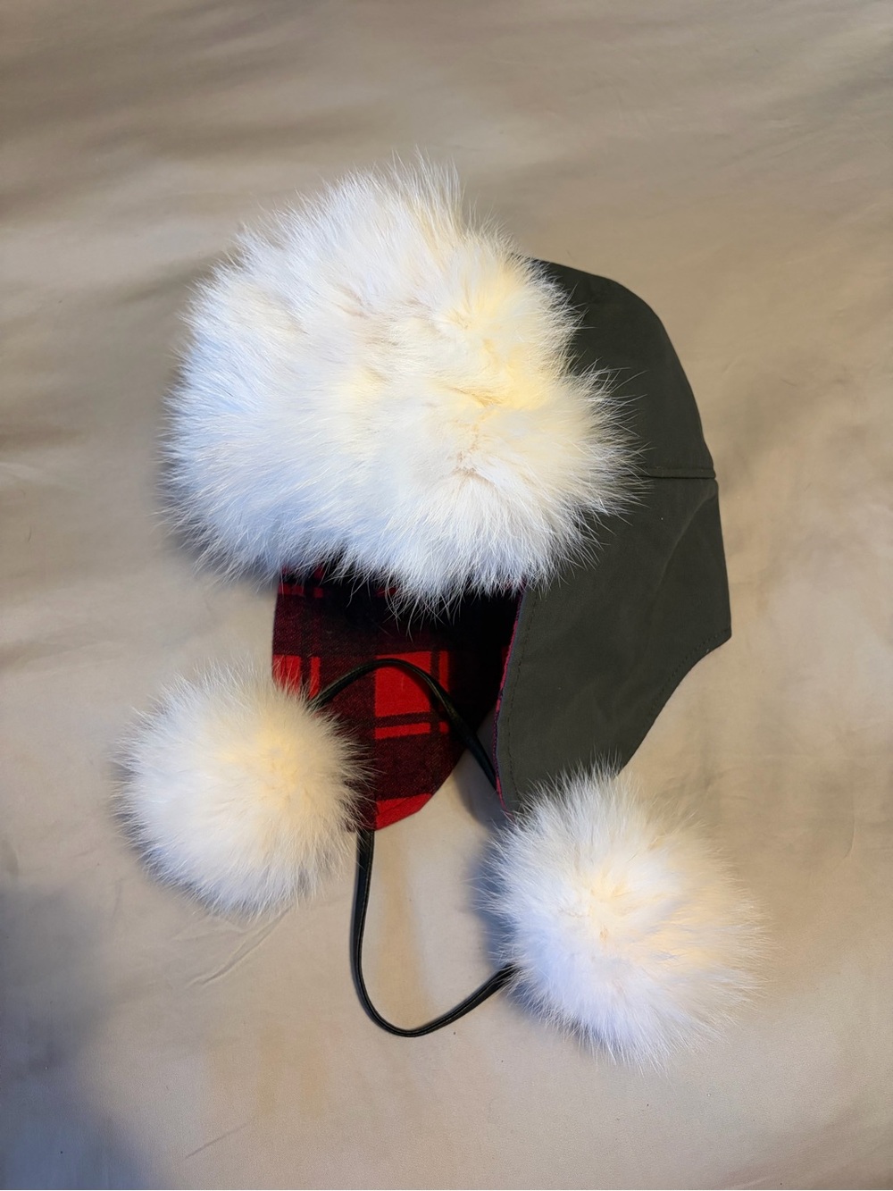 Moose Knuckles Olive Trapper Hat with White Faux Fur Poms